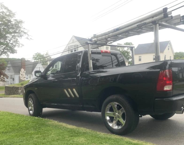 Fleet vehicle cleaning service being performed by Akron Power Washing in Akron