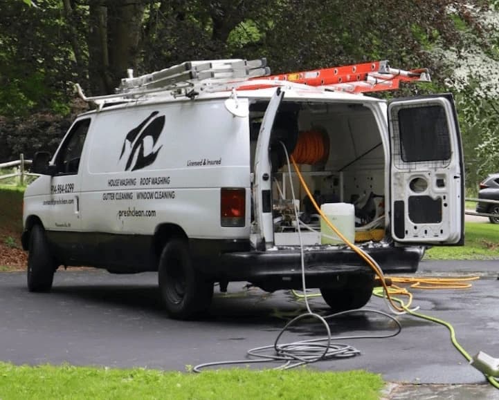 Akron Power Washing professionals cleaning commercial fleet in Akron